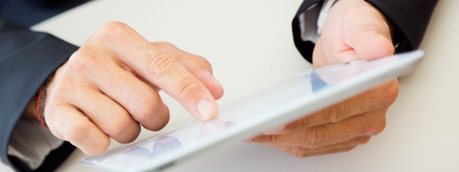 closeup portrait office worker hands with tablet