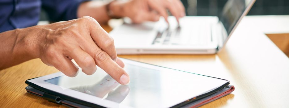 businessman working tablet scaled